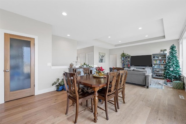 dining room with light wood-type flooring