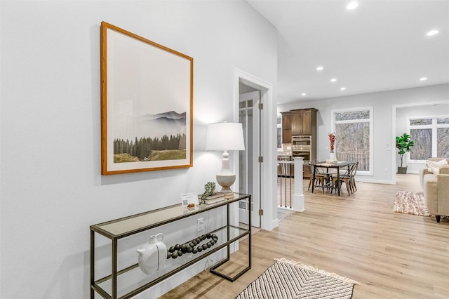 hallway featuring light hardwood / wood-style floors