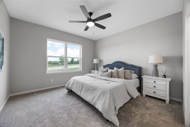334 Quiver Ct, Marion, IA 52302 - bedroom with carpet floors, baseboards, and ceiling fan