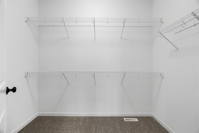 334 Quiver Ct, Marion, IA 52302 - spacious closet with dark colored carpet