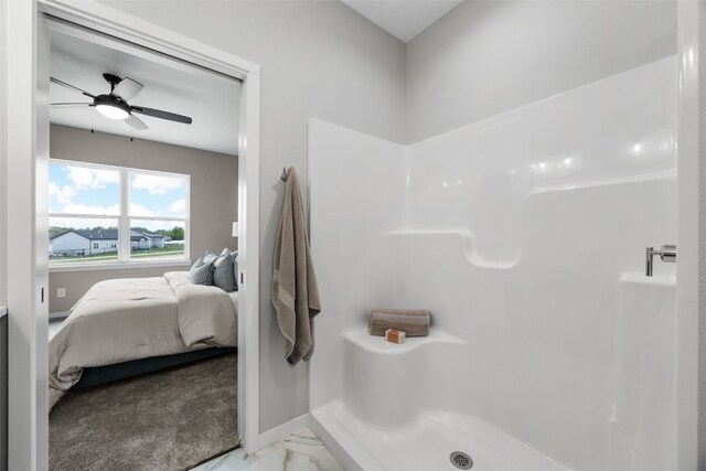 334 Quiver Ct, Marion, IA 52302 - ensuite bathroom with a shower, ceiling fan, marble look tile flooring, and baseboards