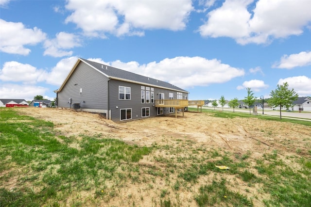334 Quiver Ct, Marion, IA 52302 - back of property featuring central AC unit and a wooden deck