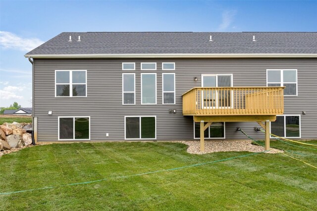 334 Quiver Ct, Marion, IA 52302 - rear view of house featuring a lawn, a wooden deck, and roof with shingles