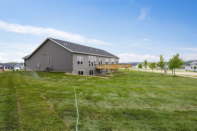 334 Quiver Ct, Marion, IA 52302 - rear view of property featuring a lawn and a wooden deck