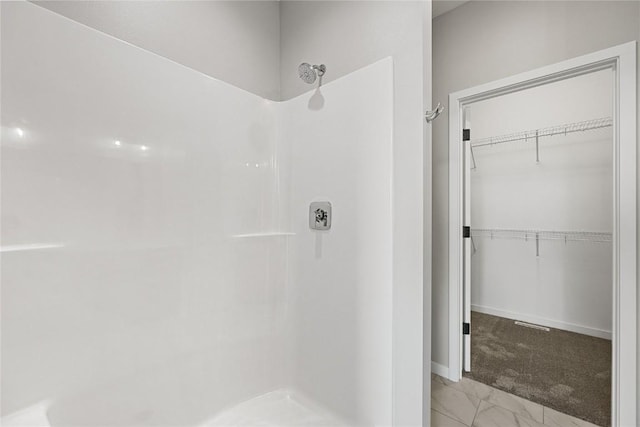 bathroom with walk in shower