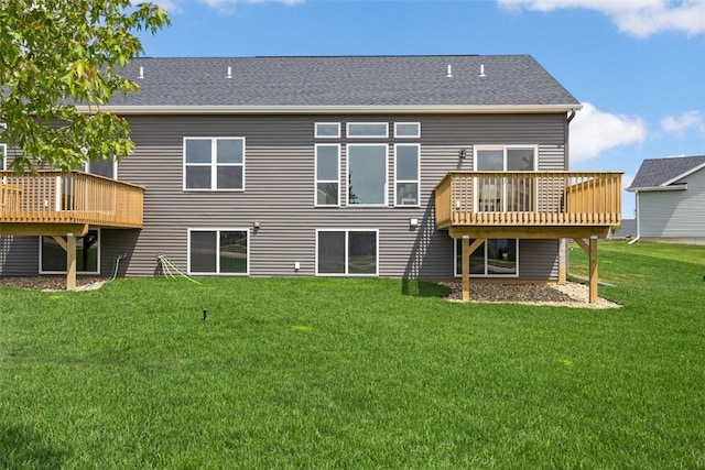 332 Quiver Ct, Marion, IA 52302 - back of house with a lawn, a wooden deck, and a shingled roof
