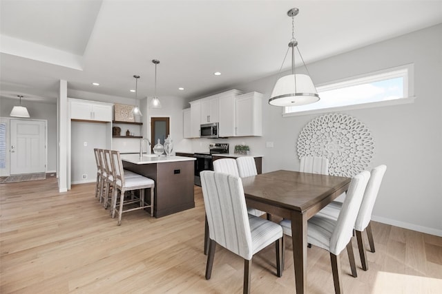 332 Quiver Ct, Marion, IA 52302 - dining space with light wood-style floors and recessed lighting