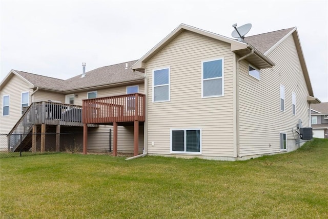 back of house with a yard, central AC unit, and a wooden deck