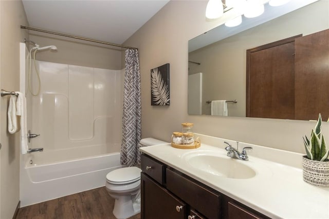 1135 Redbud Ave, Tiffin, IA 52340 - full bathroom featuring toilet, vanity, wood finished floors, and shower / tub combo with curtain