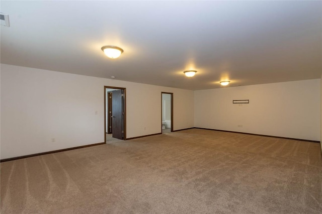 1135 Redbud Ave, Tiffin, IA 52340 - empty room with light colored carpet and baseboards