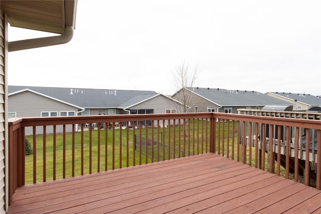 1135 Redbud Ave, Tiffin, IA 52340 - wooden terrace featuring a residential view and a yard
