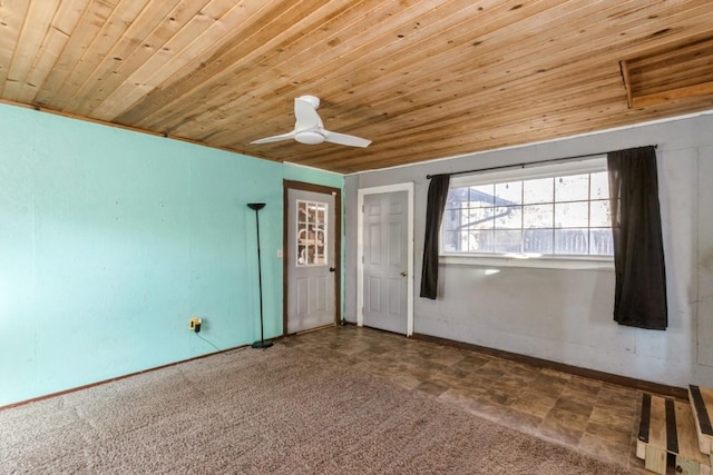 unfurnished bedroom featuring carpet floors, ceiling fan, and wooden ceiling