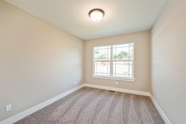 1807 Shady Grove Rd SW, Cedar Rapids, IA 52404 - carpeted empty room featuring baseboards