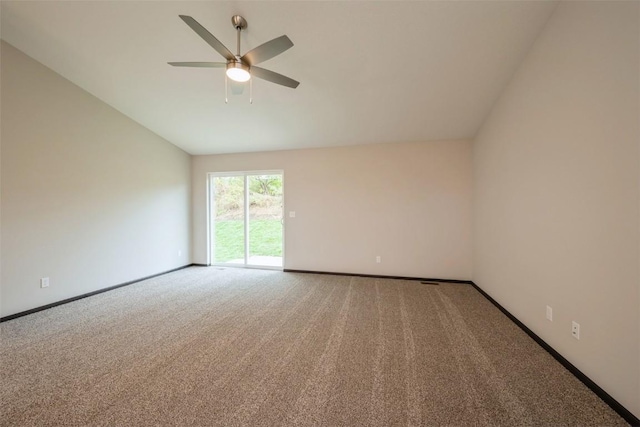 spare room featuring ceiling fan and carpet floors