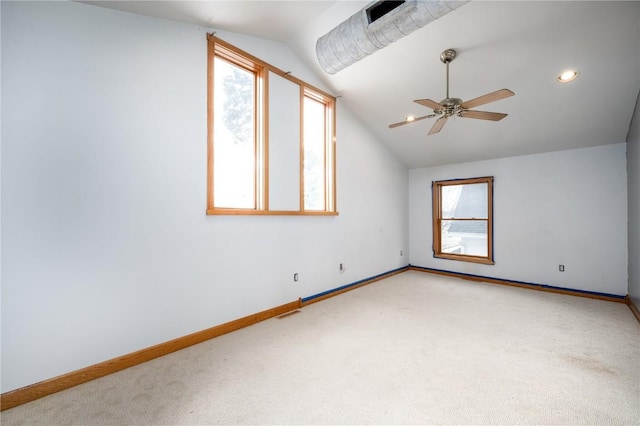 additional living space featuring vaulted ceiling, ceiling fan, and carpet floors