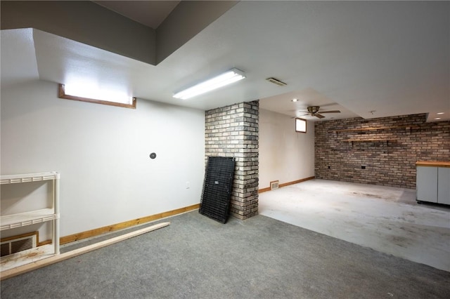 basement with brick wall and carpet floors