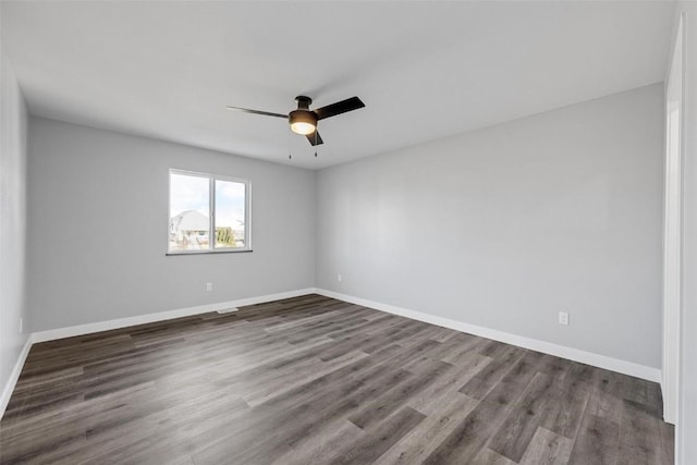 unfurnished room featuring hardwood / wood-style flooring and ceiling fan