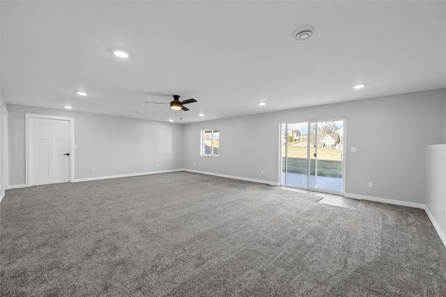 unfurnished room featuring carpet floors and ceiling fan