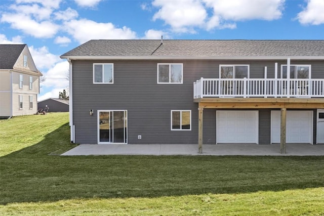 back of house featuring a lawn and a patio