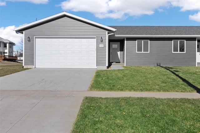 ranch-style house with a front yard and a garage