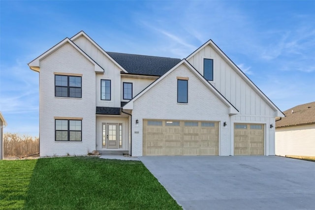 modern farmhouse with a garage and a front lawn