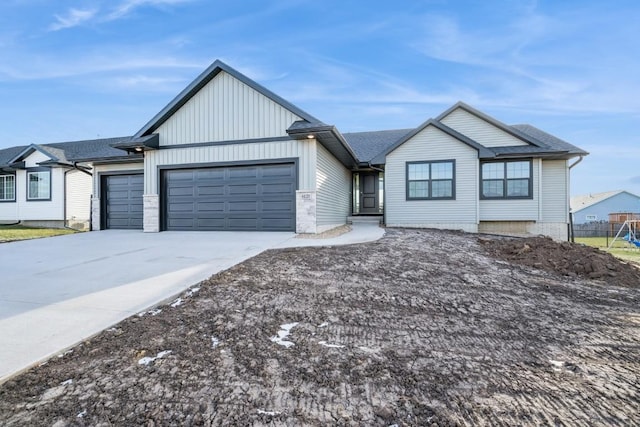 single story home with a garage