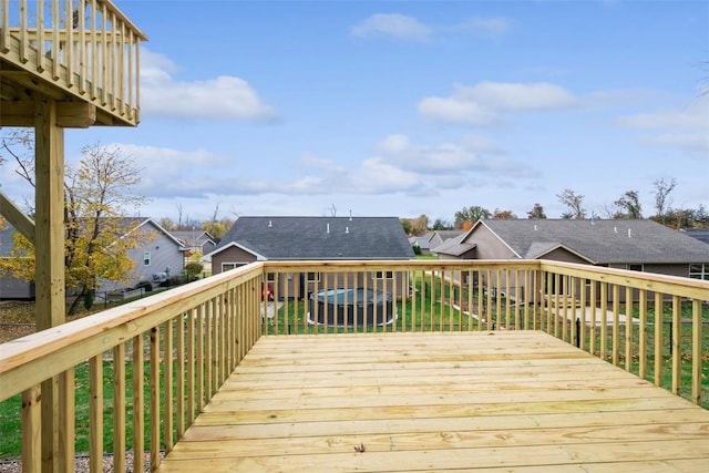 wooden deck with a residential view