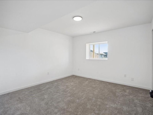 view of carpeted spare room