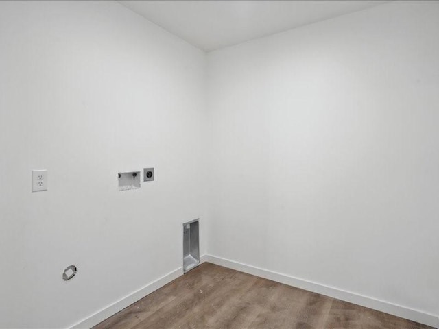 laundry room featuring hookup for an electric dryer, hardwood / wood-style flooring, and washer hookup