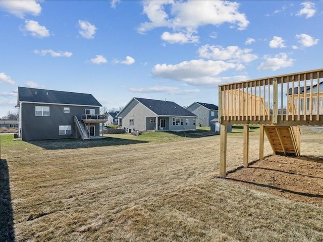 view of yard featuring a wooden deck