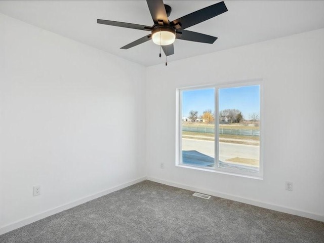 unfurnished room featuring carpet flooring and ceiling fan