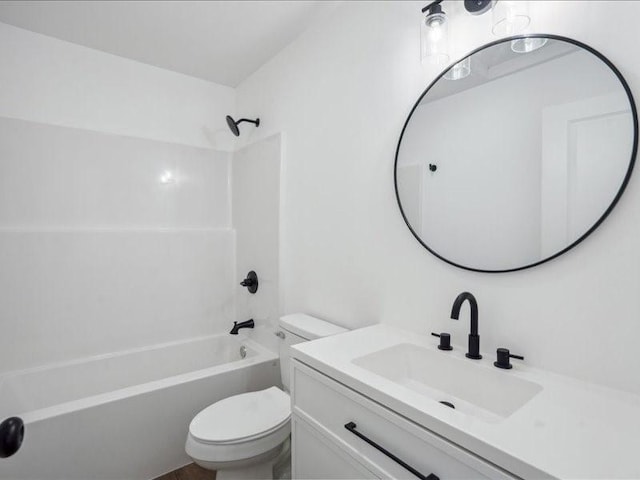 full bathroom with shower / bathing tub combination, vanity, and toilet