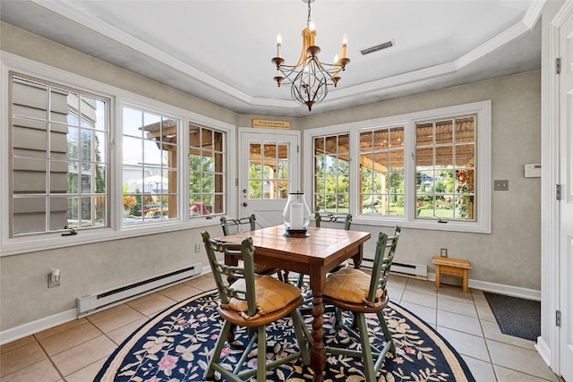 tiled dining area with a notable chandelier, ornamental molding, baseboard heating, and a tray ceiling