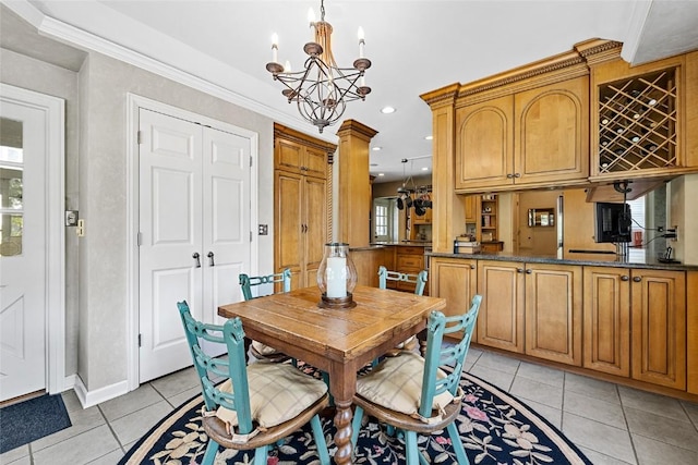 tiled dining room with crown molding and a chandelier