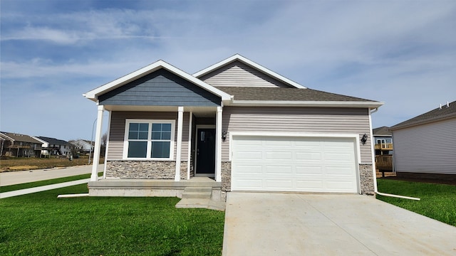 view of front facade with a garage and a front yard