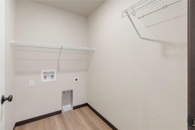 laundry area featuring washer hookup, hookup for an electric dryer, laundry area, light wood-type flooring, and baseboards