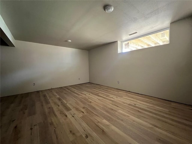 below grade area with wood finished floors