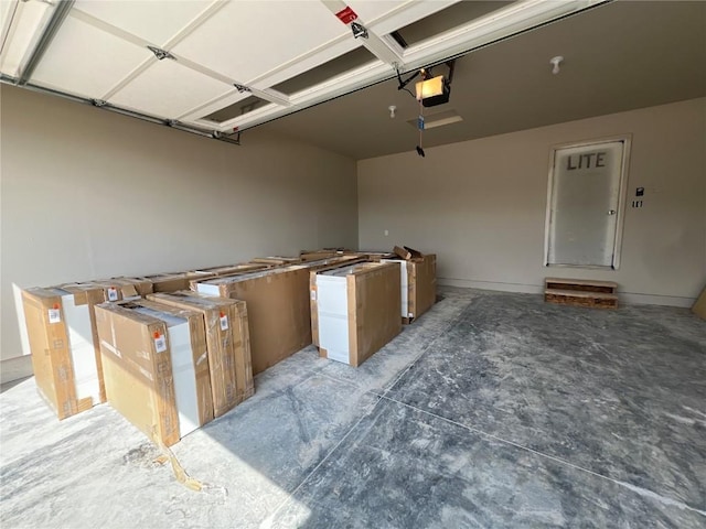 garage featuring a garage door opener