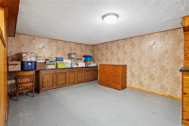 interior space with a textured ceiling