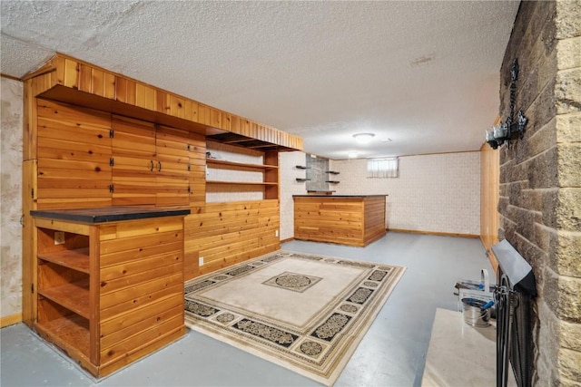 interior space with a textured ceiling