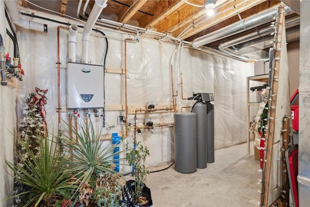 utility room featuring water heater