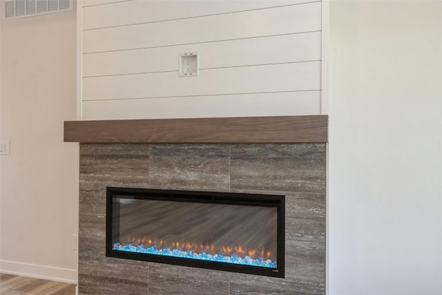 interior details with hardwood / wood-style flooring