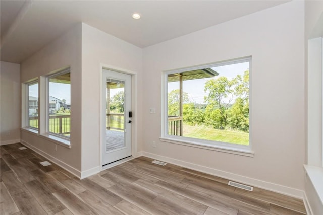 doorway featuring hardwood / wood-style floors