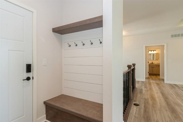 mudroom featuring light wood-type flooring