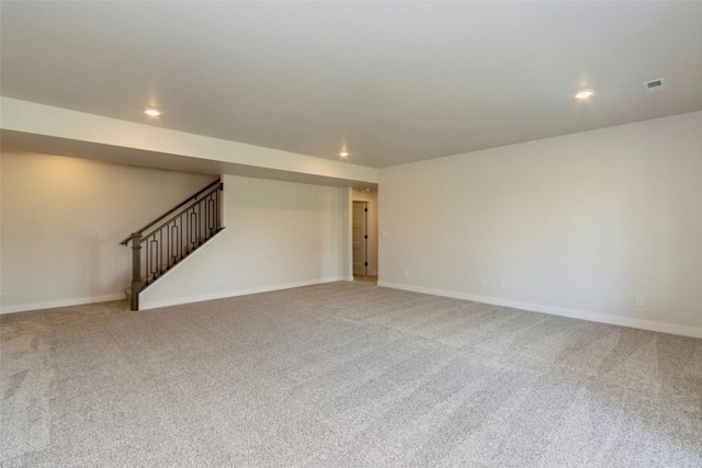 unfurnished living room with carpet floors