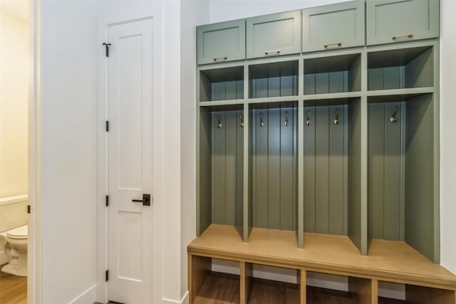 mudroom with wood-type flooring