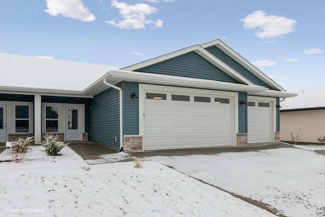 view of front of property featuring a garage