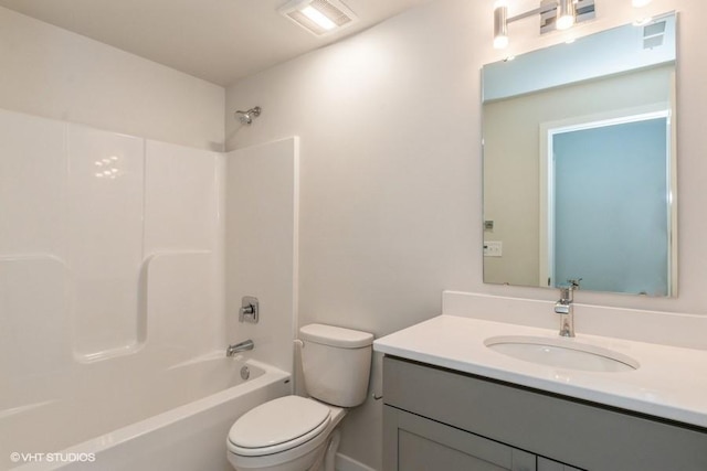 full bathroom with vanity, toilet, and shower / tub combination