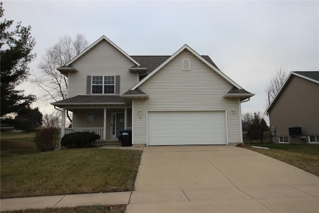 view of front facade featuring a front lawn, a porch, and a garage