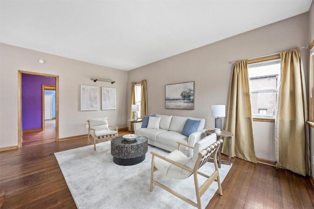 living room with dark wood-type flooring